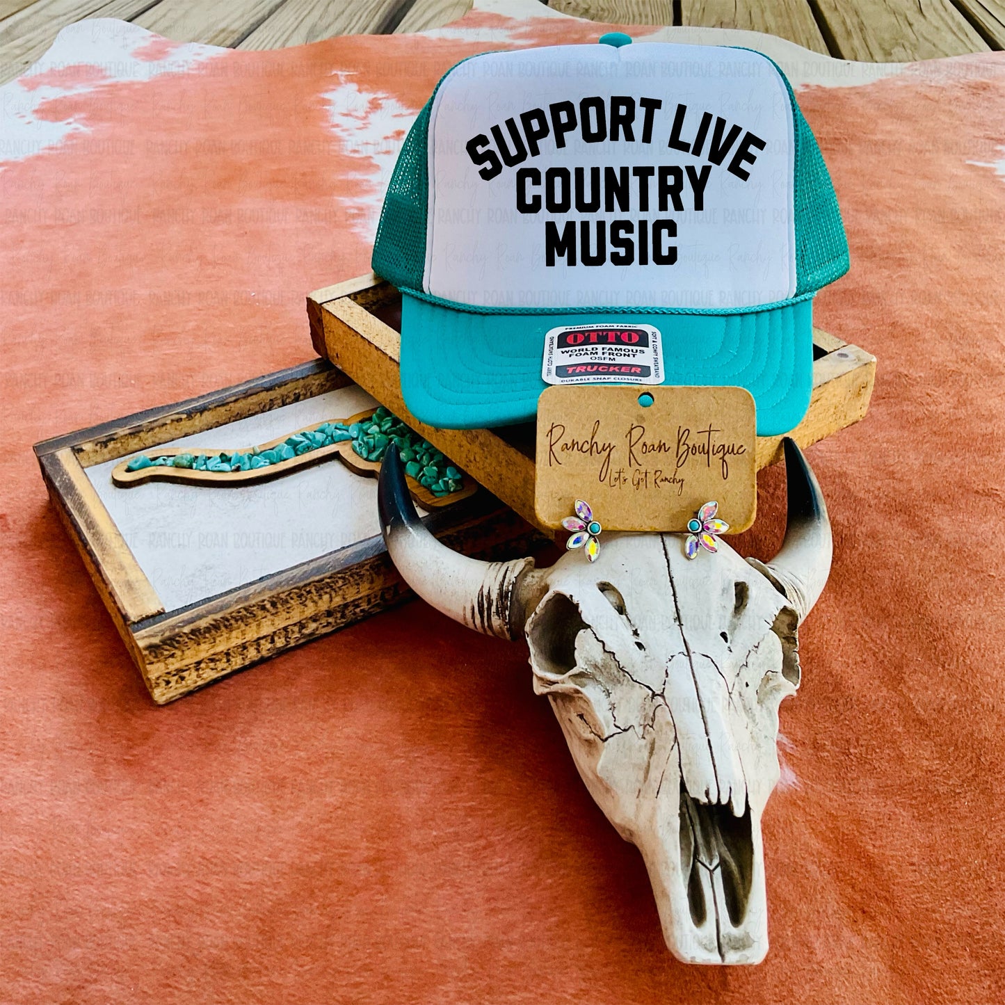 Foam trucker hat with Support Live Country Music sublimation graphic, breathable mesh back, and adjustable snapback. Ideal for Western boutiques.