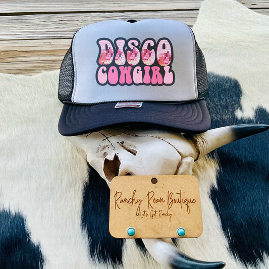 Front view of the “Disco Cowgirl” Foam Front Trucker Hat featuring a vibrant sublimation print with retro disco theme.