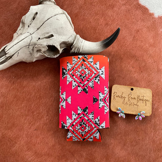 Neon Aztec Cowhide Koozie featuring a bold pink and orange Aztec design with faux cowhide speckles, perfect for keeping drinks cold.
