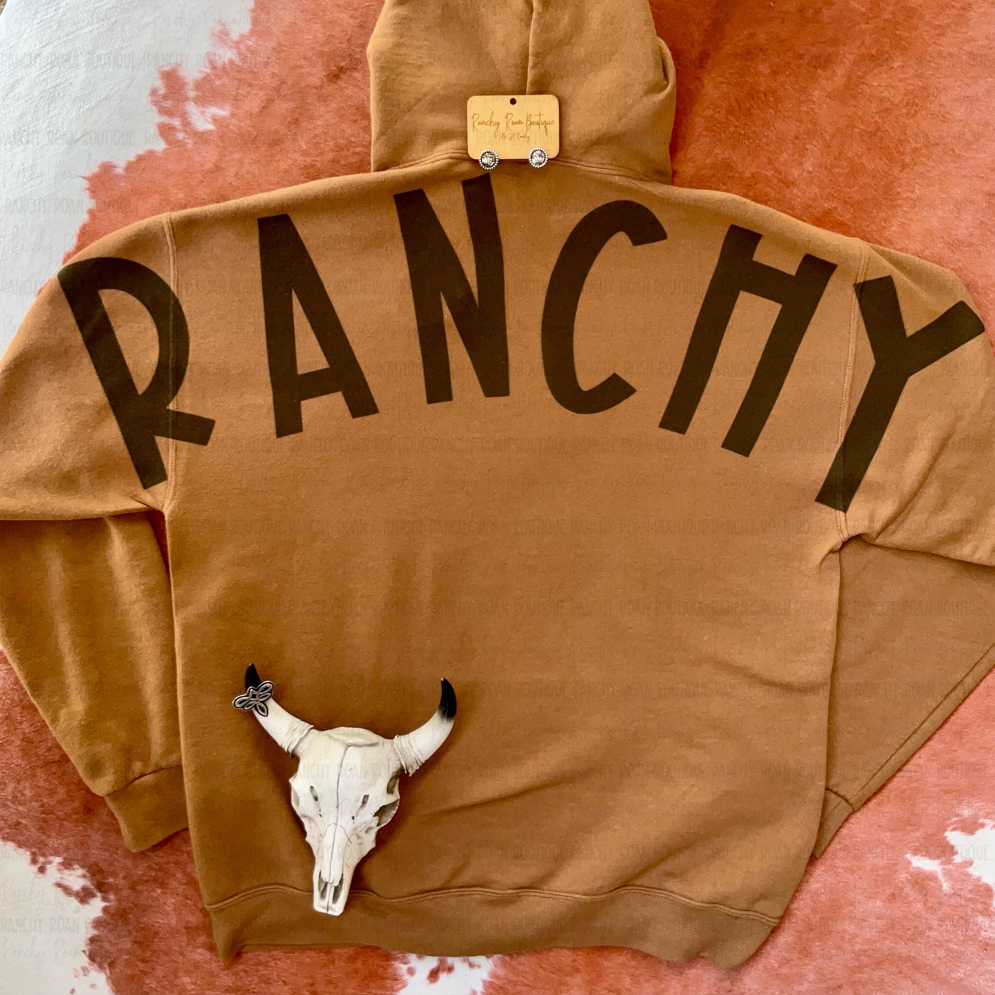 Western Ranchy Graphic Hoodie featuring bold sublimated back lettering in a soft unisex fit.