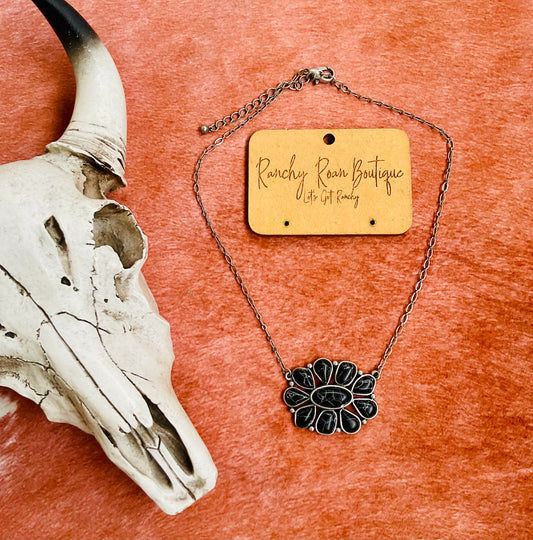 Western concho pendant necklace with an adjustable silver chain, perfect for cowgirl-inspired fashion.