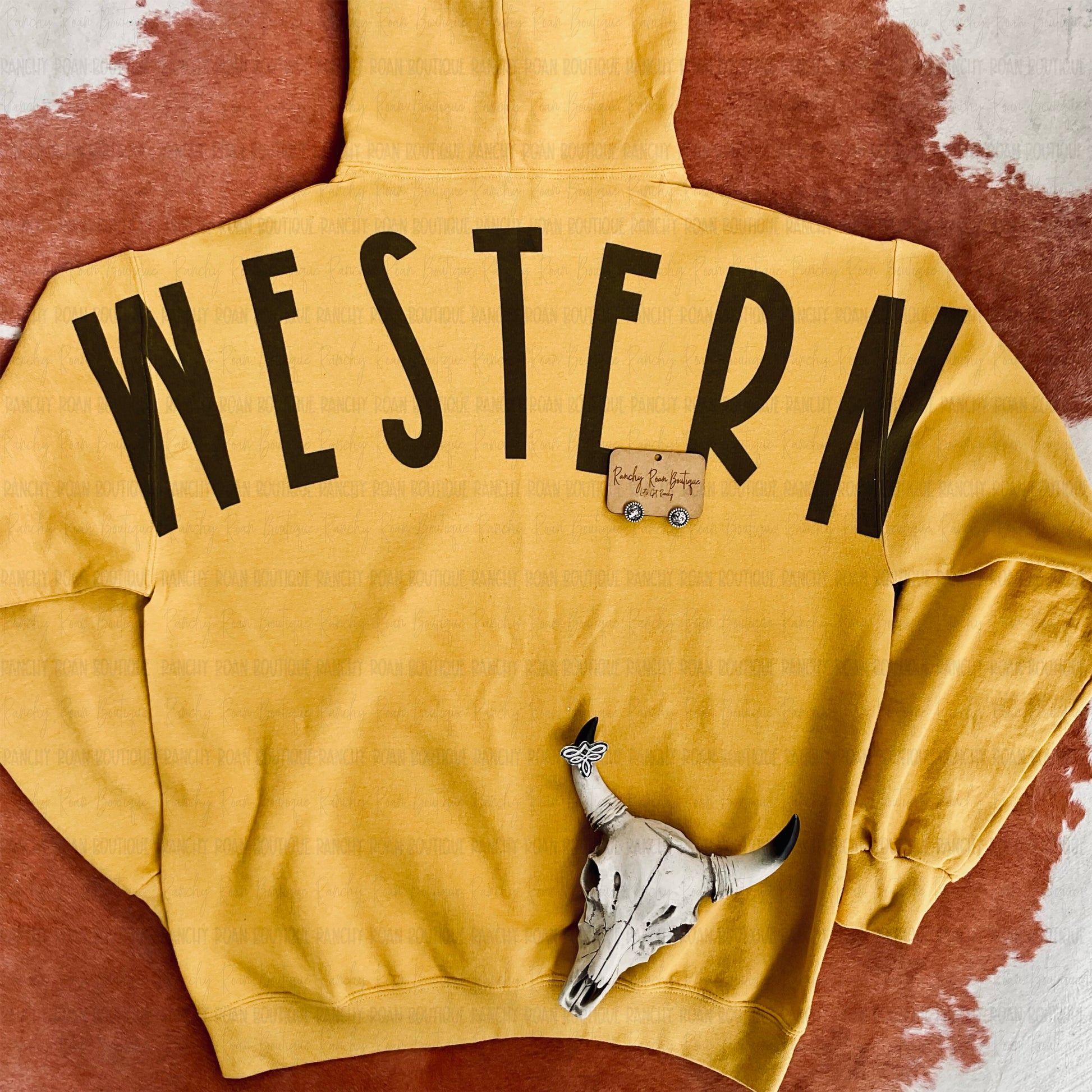 Western Ranchy Graphic Hoodie featuring bold sublimated back lettering in a soft unisex fit.