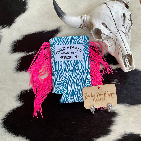 Blue zebra print koozie with “Wild Hearts Can’t Be Broken” text and bright pink fringe.