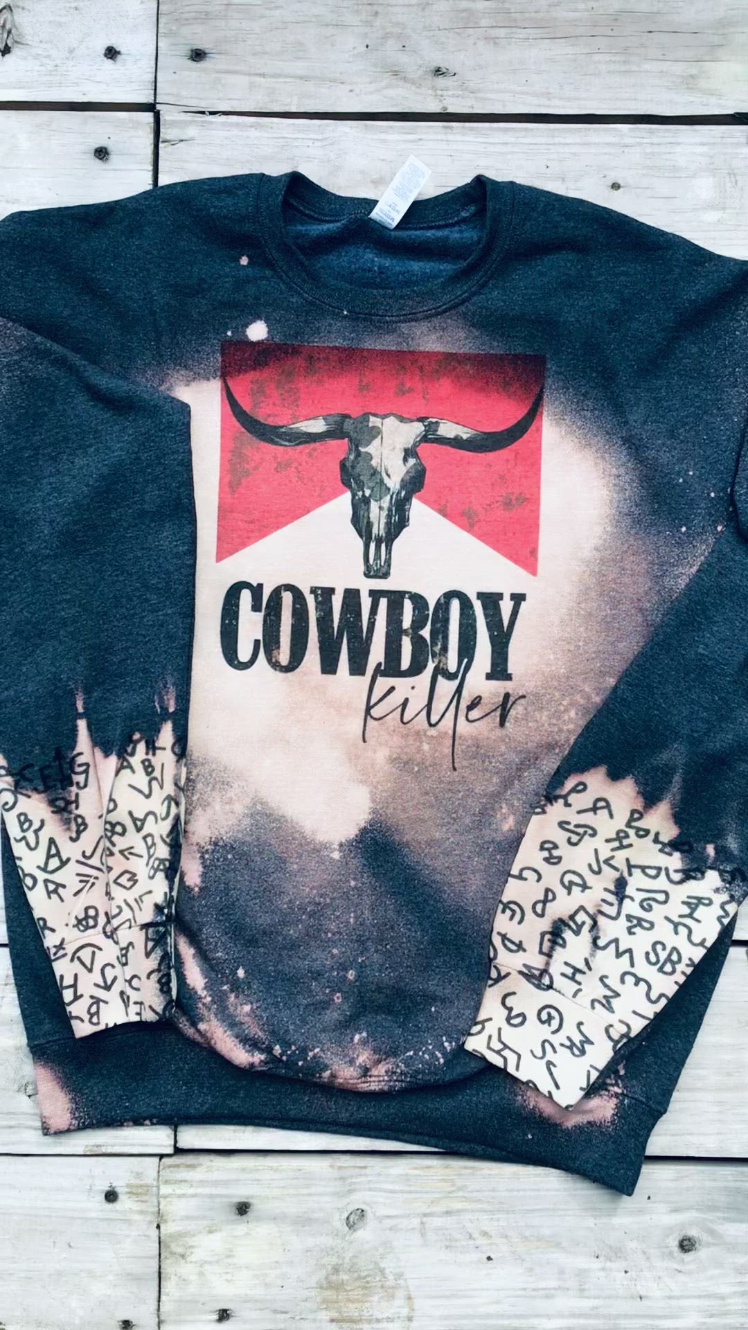 Cowboy Killer Sweatshirt on white deck